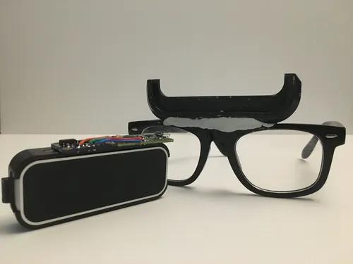 LeapMax hardware: A Leap Motion Controller and a pair of glasses with a custom mount